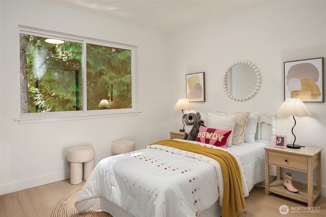 16302 NE 104th St, Redmond, WA 98052 - bedroom featuring wood finished floors and baseboards