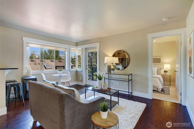 120 NW 39th St Unit 406, Seattle, WA 98107 - living room featuring wood finished floors and baseboards