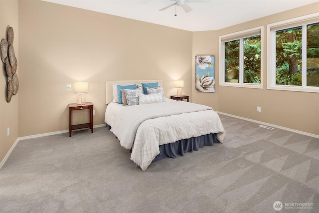 15606 Country Club Dr Unit B, Bothell, WA 98012 - carpeted bedroom featuring baseboards and ceiling fan