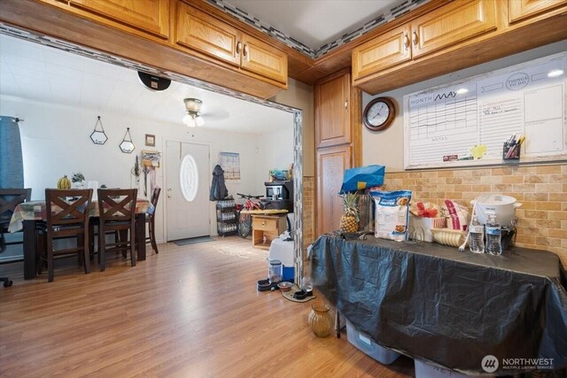412 Maple Ct, Toppenish, WA 98948 - miscellaneous room featuring light wood-style flooring and ceiling fan