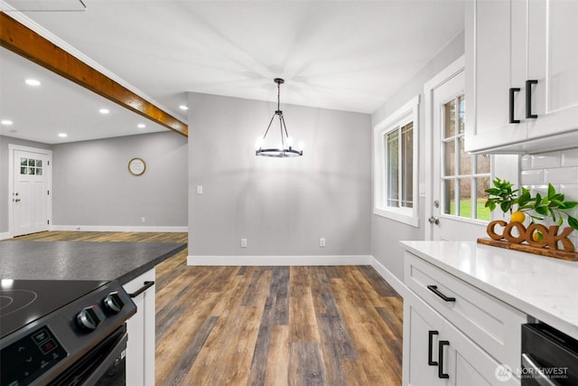 3107 34th Street Ct E, Tacoma, WA 98443 - kitchen with range with electric stovetop, recessed lighting, baseboards, dark wood-style floors, and white cabinets
