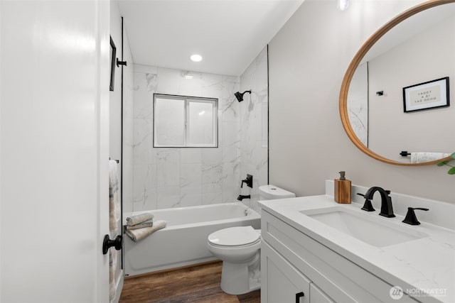 3107 34th Street Ct E, Tacoma, WA 98443 - bathroom with vanity, toilet, shower / washtub combination, and wood finished floors