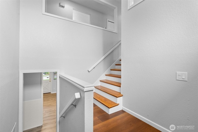 13304 SE 248th Pl, Kent, WA 98042 - stairway featuring wood finished floors and baseboards