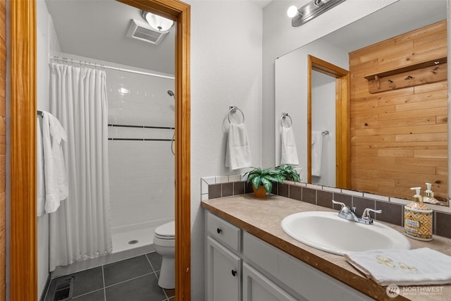 13304 SE 248th Pl, Kent, WA 98042 - bathroom featuring vanity, tile patterned floors, a stall shower, and wood walls