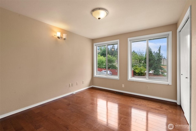 13304 SE 248th Pl, Kent, WA 98042 - unfurnished room with dark wood-style flooring