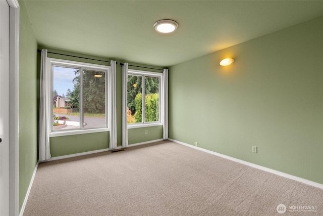 13304 SE 248th Pl, Kent, WA 98042 - empty room with healthy amount of natural light and carpet floors