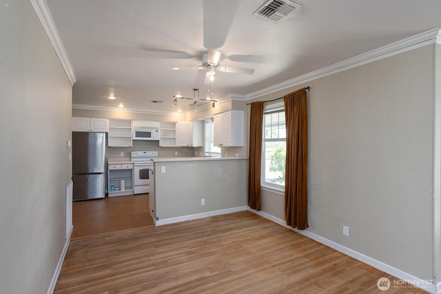 614 E Main Ave, Soap Lake, WA 98851 - kitchen with white appliances, open shelves, a ceiling fan, white cabinetry, and crown molding