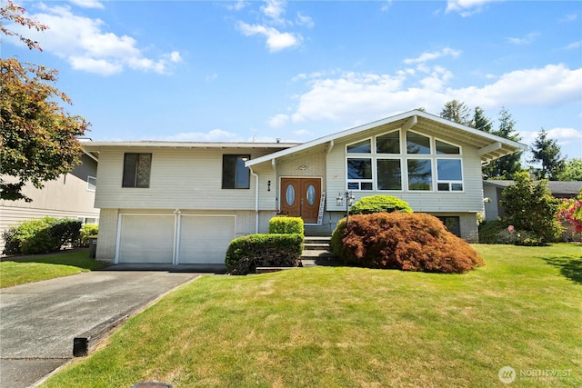 3616 W Rusley Dr, Bellingham, WA 98225 - raised ranch with driveway, a garage, a front yard, and brick siding