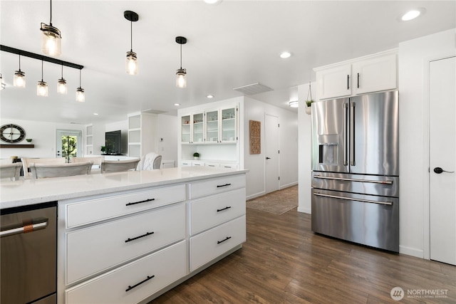3827 90th Ave E, Edgewood, WA 98371 - kitchen with stainless steel appliances, dark wood-style floors, glass insert cabinets, white cabinets, and light countertops