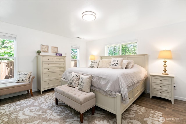3827 90th Ave E, Edgewood, WA 98371 - bedroom featuring multiple windows, wood finished floors, and baseboards