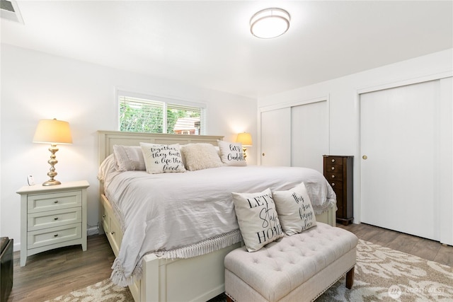 3827 90th Ave E, Edgewood, WA 98371 - bedroom featuring multiple closets and wood finished floors