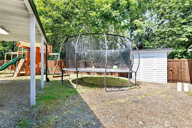 3827 90th Ave E, Edgewood, WA 98371 - view of yard featuring a trampoline and a playground