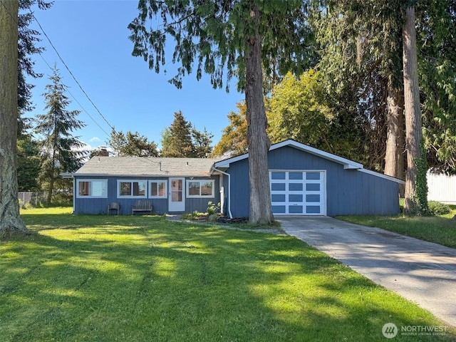 81 Robbins Rd, Sequim, WA 98382 - view of front of property featuring a chimney, concrete driveway, and an attached garage