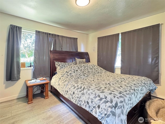 81 Robbins Rd, Sequim, WA 98382 - bedroom featuring light wood-style flooring and baseboards
