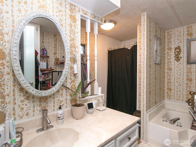 81 Robbins Rd, Sequim, WA 98382 - bathroom featuring wallpapered walls, vanity, and a bath