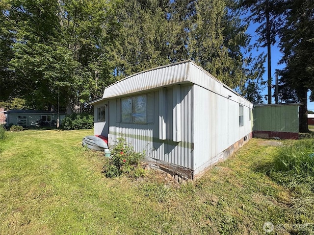 81 Robbins Rd, Sequim, WA 98382 - view of side of home with a yard