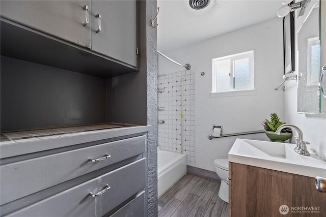 1203 S 8th Ave, Yakima, WA 98902 - bathroom with vanity,  shower combination, and wood finished floors