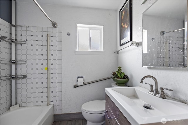 1203 S 8th Ave, Yakima, WA 98902 - full bathroom featuring vanity, shower / bathtub combination, and wood finished floors
