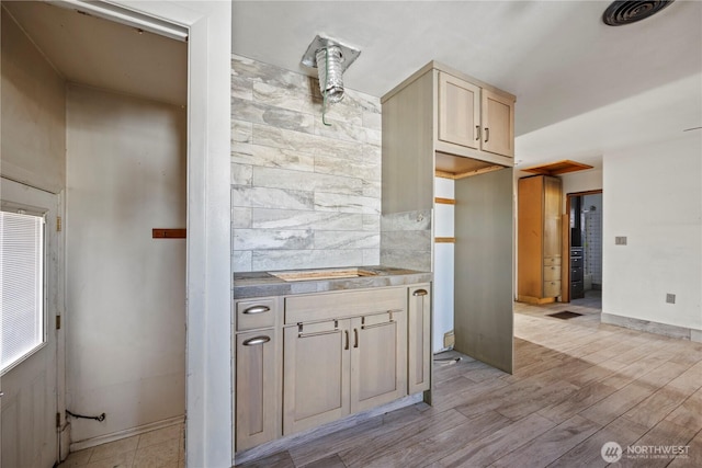 1203 S 8th Ave, Yakima, WA 98902 - kitchen featuring light wood-style floors and light brown cabinets