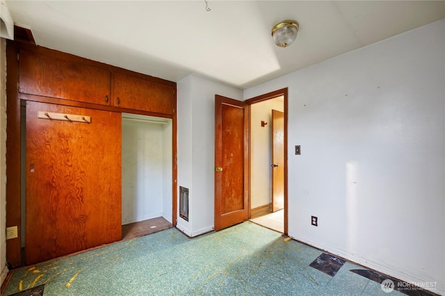 1203 S 8th Ave, Yakima, WA 98902 - unfurnished bedroom featuring baseboards and a closet