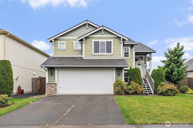 167 Goldmyer Dr, Chehalis, WA 98532 - view of front of property with a shingled roof, a garage, stairway, and driveway