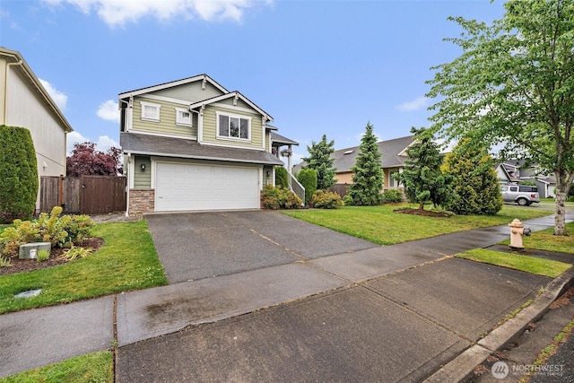 167 Goldmyer Dr, Chehalis, WA 98532 - view of front of house featuring a garage, driveway, and stone siding