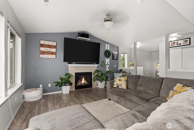 167 Goldmyer Dr, Chehalis, WA 98532 - living room with ceiling fan, wood finished floors, lofted ceiling, a fireplace, and baseboards