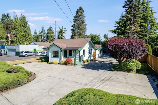 1023 W Stewart Ave, Puyallup, WA 98371 - bungalow-style home with a chimney