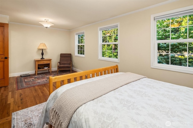 8724 Main St, Edmonds, WA 98026 - bedroom with wood finished floors, crown molding, and baseboards