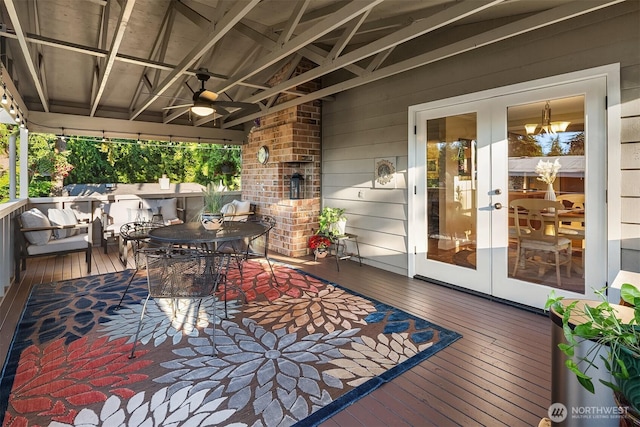 8724 Main St, Edmonds, WA 98026 - wooden deck with french doors, outdoor dining space, and a ceiling fan