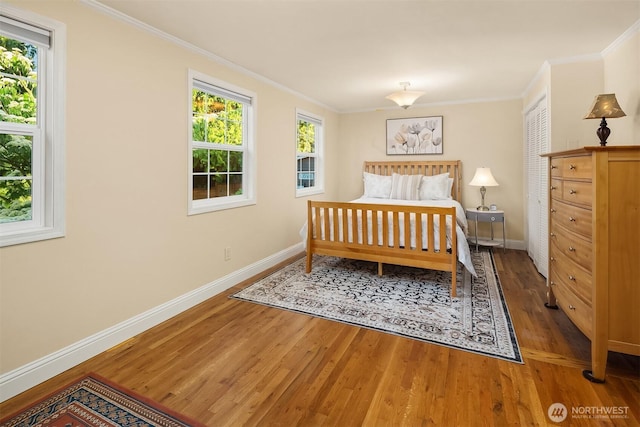 8724 Main St, Edmonds, WA 98026 - bedroom featuring wood finished floors, baseboards, and crown molding