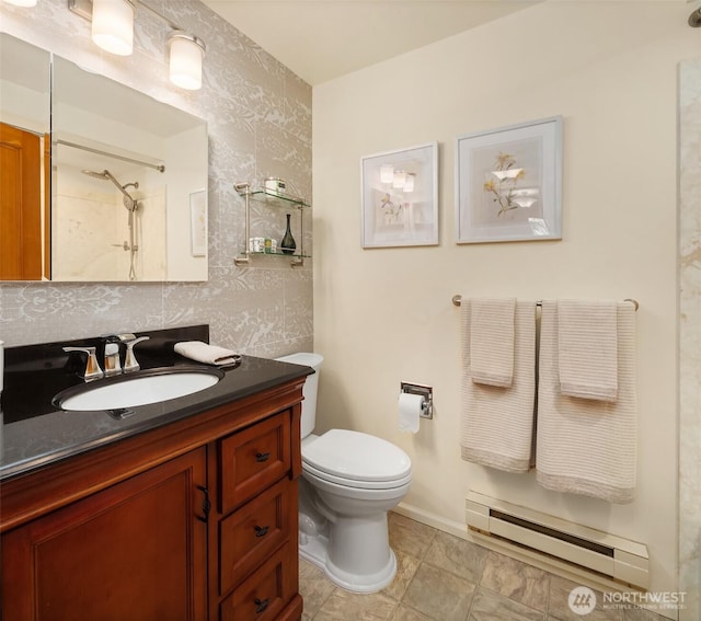 8724 Main St, Edmonds, WA 98026 - bathroom featuring baseboard heating, vanity, toilet, and a shower