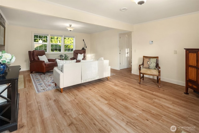 8724 Main St, Edmonds, WA 98026 - living room with light wood-style floors, ornamental molding, and baseboards