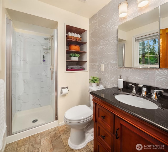 8724 Main St, Edmonds, WA 98026 - full bath featuring a marble finish shower, vanity, toilet, and baseboards