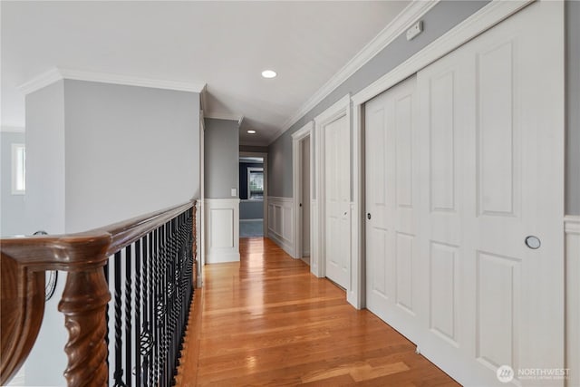 13374 SE 308th Ct, Auburn, WA 98092 - corridor with ornamental molding, light wood-style floors, recessed lighting, wainscoting, and a decorative wall
