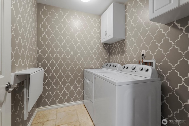 13374 SE 308th Ct, Auburn, WA 98092 - laundry area with cabinet space, washing machine and clothes dryer, baseboards, and wallpapered walls