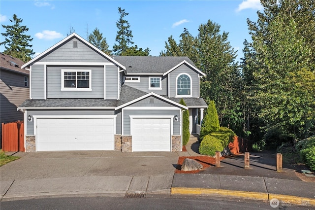 13374 SE 308th Ct, Auburn, WA 98092 - view of front of property with stone siding, concrete driveway, a shingled roof, and a garage