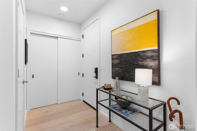 999 110th Ave NE Unit 202, Bellevue, WA 98004 - entrance foyer featuring light wood-style floors