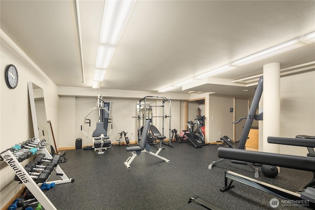 2015 Terry Ave Unit 313, Seattle, WA 98121 - exercise room featuring baseboards