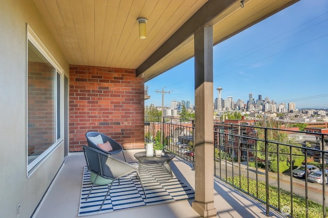330 W Olympic Pl Unit 302, Seattle, WA 98119 - balcony featuring a skyline view