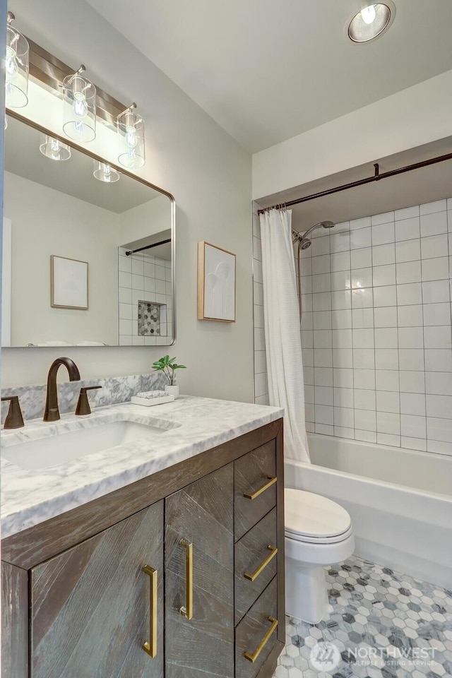 330 W Olympic Pl Unit 302, Seattle, WA 98119 - bathroom with vanity, toilet, shower / bathtub combination with curtain, and tile patterned flooring