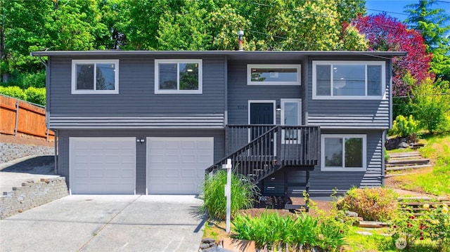 5134 S Wallace St, Seattle, WA 98178 - split foyer home featuring an attached garage and driveway