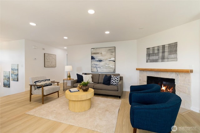 5134 S Wallace St, Seattle, WA 98178 - living area featuring a fireplace, wood finished floors, and recessed lighting