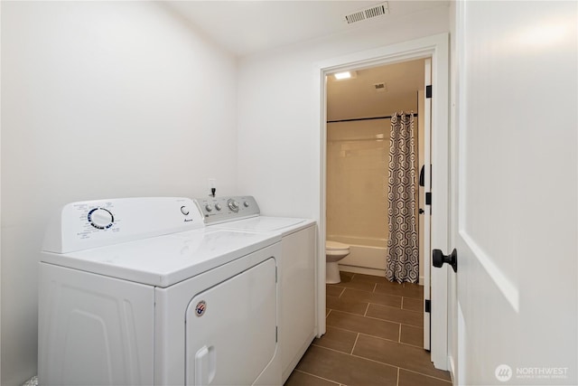 5134 S Wallace St, Seattle, WA 98178 - laundry room with separate washer and dryer and tile patterned floors