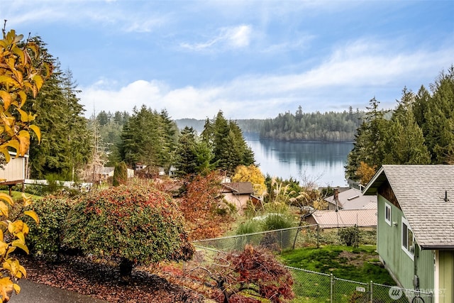 110 E Sea Breeze Dr, Grapeview, WA 98546 - water view featuring a fenced backyard and a heavily wooded area