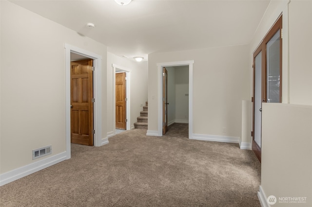 110 E Sea Breeze Dr, Grapeview, WA 98546 - unfurnished bedroom featuring carpet floors, a walk in closet, and baseboards