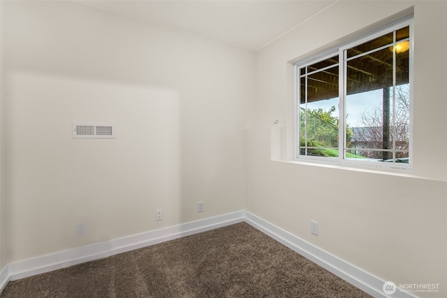110 E Sea Breeze Dr, Grapeview, WA 98546 - unfurnished room with baseboards and dark colored carpet