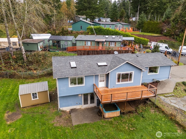110 E Sea Breeze Dr, Grapeview, WA 98546 - rear view of property with roof with shingles, a patio area, and a residential view