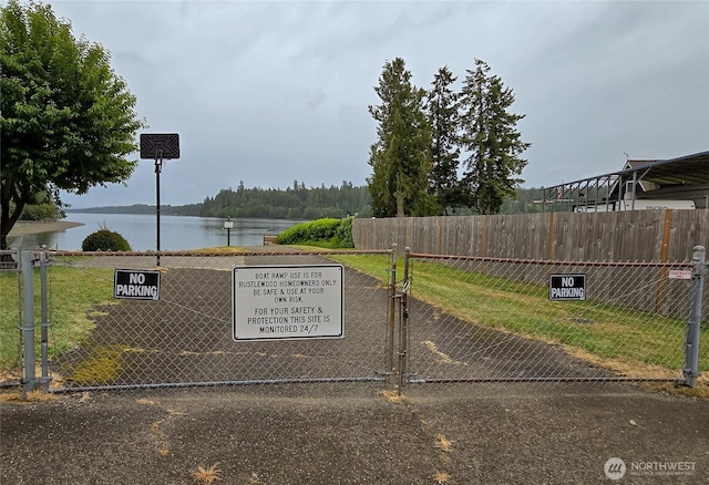 110 E Sea Breeze Dr, Grapeview, WA 98546 - view of home's community with a water view and a gate