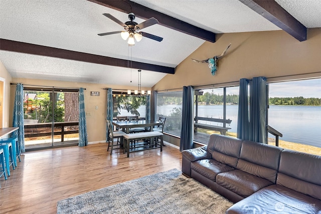 268 Kingsway W, Bremerton, WA 98312 - living room with a ceiling fan, wood finished floors, a textured ceiling, and a water view